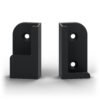 Deux supports noirs mats pour clavier K400 Plus, vue de face montrant les berceaux et les fraisures